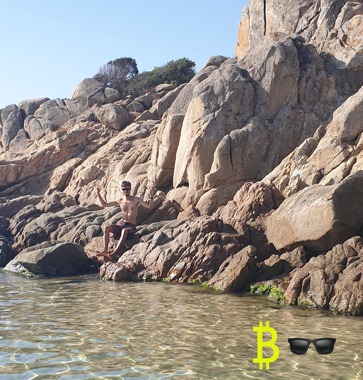 Wearing sun glasses at the Su Giudeu Beach